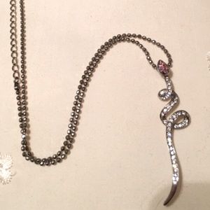 Necklace and snake pendant